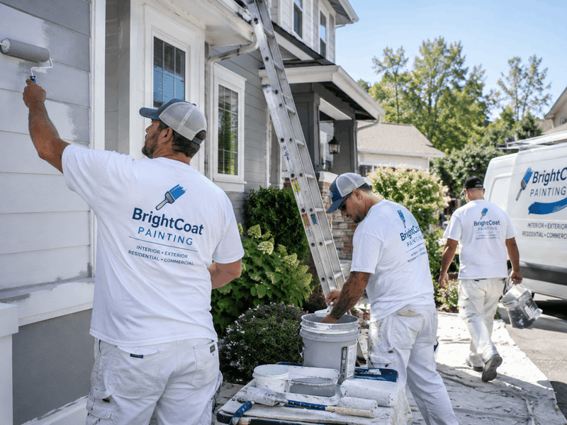 Branded painting crew working at a residential job site