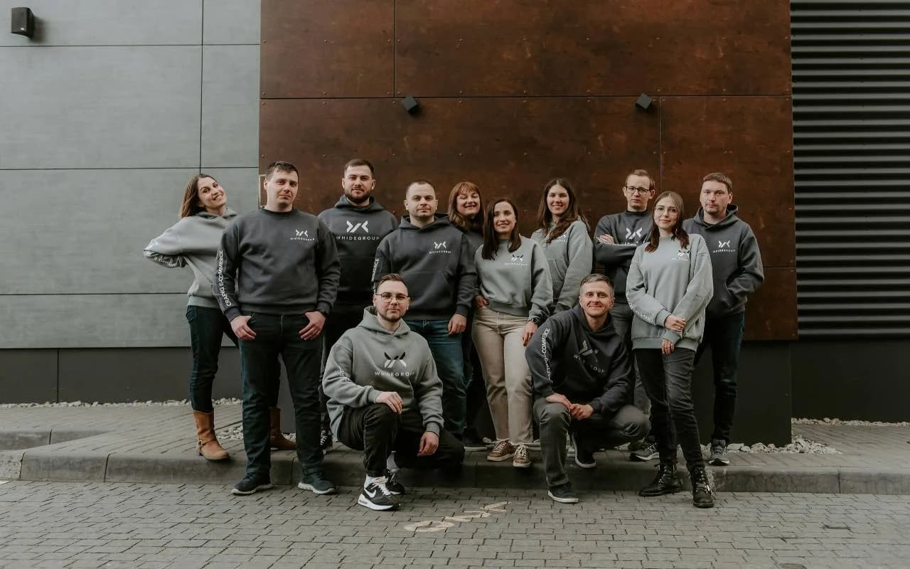 Business team wearing matching custom branded apparel for brand consistency